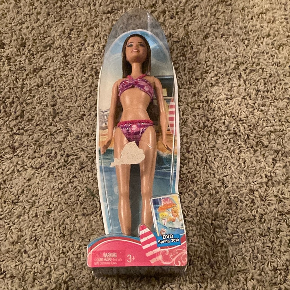 New Barbie Beach Doll with  surfboard. New